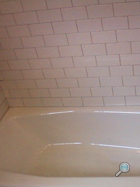 New bath tub & tile surround - awaiting grout, shower fixtures, and finishing touches